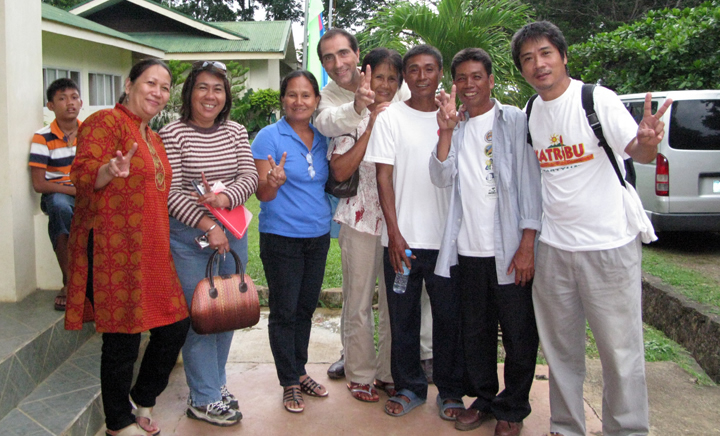 Picture of happy people celebrating the latest news on the mining debate in Palawan